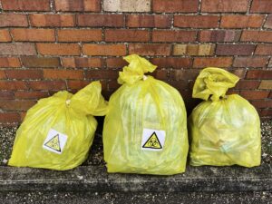 Biohazard trash bags outside for Clinical Waste Disposal in Baytown, Texas