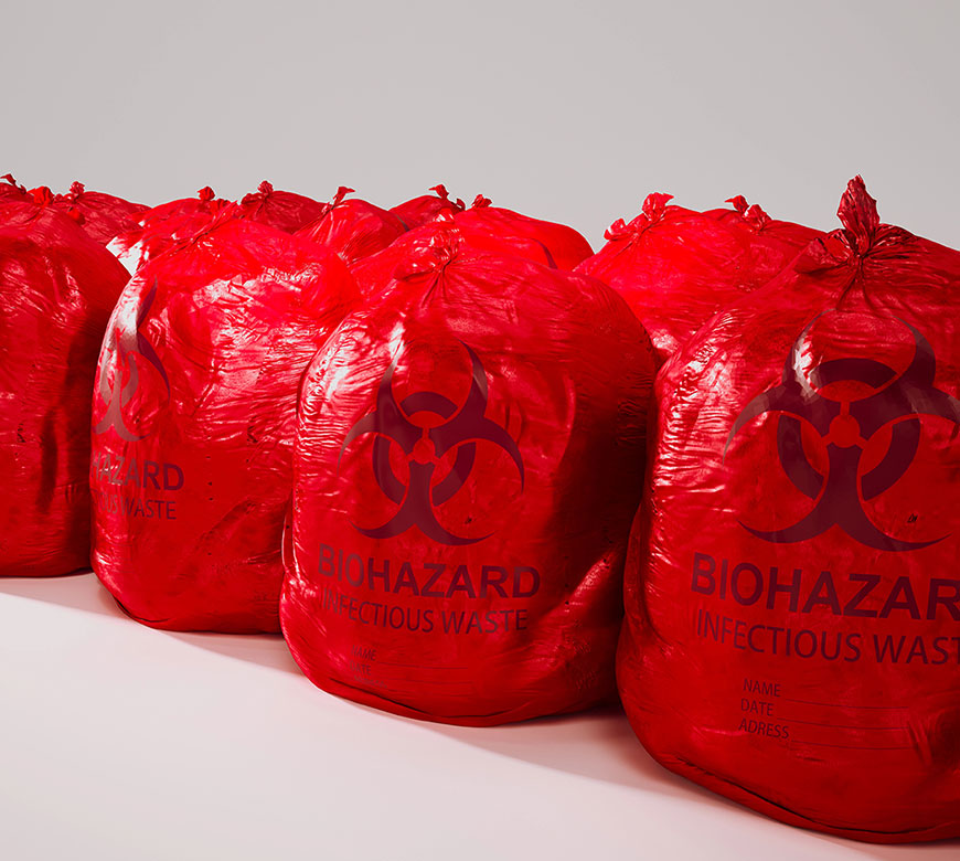Red biohazard bags ready for Medical waste disposal in Cypress