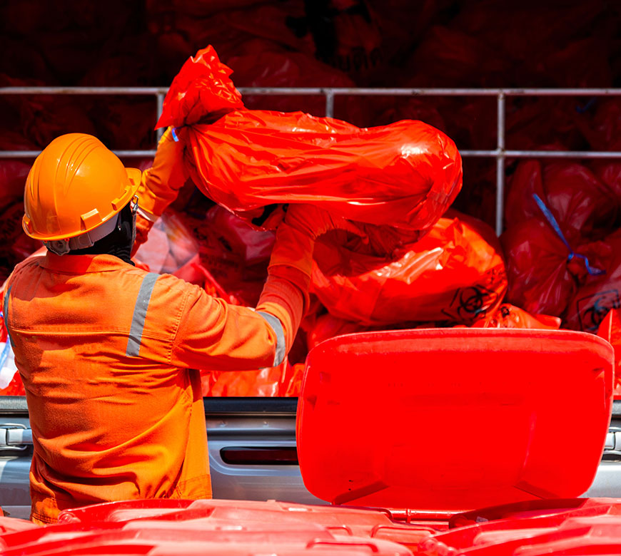 Red bag waste collection in progress in Deer Park, TX
